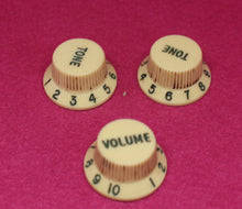 Load image into Gallery viewer, Original Fender Aged Cream Knobs with Green Font for Fender® Stratocaster