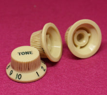 Load image into Gallery viewer, Original Fender Aged Cream Knobs with Green Font for Fender® Stratocaster