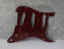 Load image into Gallery viewer, Standard Pickguard For 62 Strat For Fender - Reddish Brown Tortoise Shell