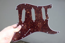 Load image into Gallery viewer, Standard Pickguard For 62 Strat For Fender - Dark Brown Tortoise Shell
