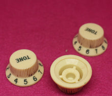 Load image into Gallery viewer, Original Fender Aged Cream Knobs with Green Font for Fender® Stratocaster
