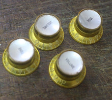 Load image into Gallery viewer, Aged Reflector Top Hat Knobs For Les Paul Guitars (4) - Gold w/ Silver Inserts
