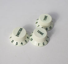 Load image into Gallery viewer, Original Fender NOS Parchment Knobs with Green Font for Fender® Stratocaster

