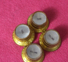 Load image into Gallery viewer, Aged Reflector Top Hat Knobs For Les Paul Guitars (4) - Gold w/ Silver Inserts
