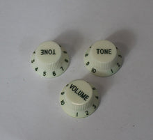 Load image into Gallery viewer, NOS Aged Knobs For USA Stratocaster - Aged White w/Green Font
