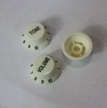 Load image into Gallery viewer, NOS Aged Knobs For USA Stratocaster - Aged White w/Green Font
