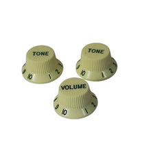Load image into Gallery viewer, NOS Aged Knobs For USA Stratocaster - Vintage Yellow w/Green Font
