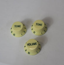 Load image into Gallery viewer, NOS Aged Knobs For USA Stratocaster - Vintage Yellow w/Green Font

