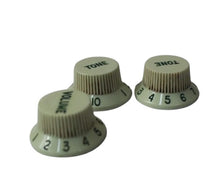 Load image into Gallery viewer, Aged Knobs Set For USA Stratocaster - Mint Green w/ Green Font
