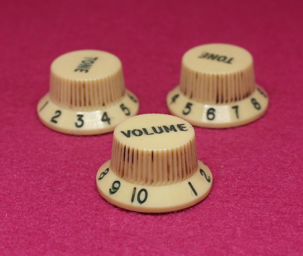 Original Fender Aged Cream Knobs with Green Font for Fender® Stratocaster