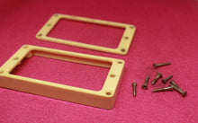 Load image into Gallery viewer, Aged Cream Humbucker Mounting Rings For Gibson Guitars  with M69 Screws -  S#2
